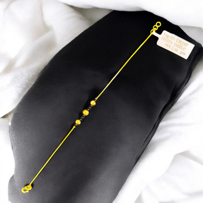 GOLD WRISTLET- BIS CERTIFIED HUID HALLMARK 375 9KT GOLD WRISTLET APPROX WGT: 1.340 FOR WOMEN.