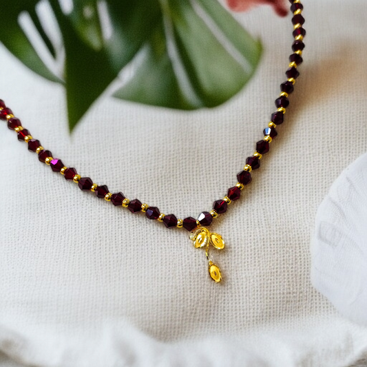 TRJ WGT: 0.160 GM APPROX KDM GOLD LEAF DESIGN LOCKET 1 PIECE WITH MAROON CRYSTAL ADJUSTABLE TASSEL FOR GIFT PURPOSE (50 TONCH).