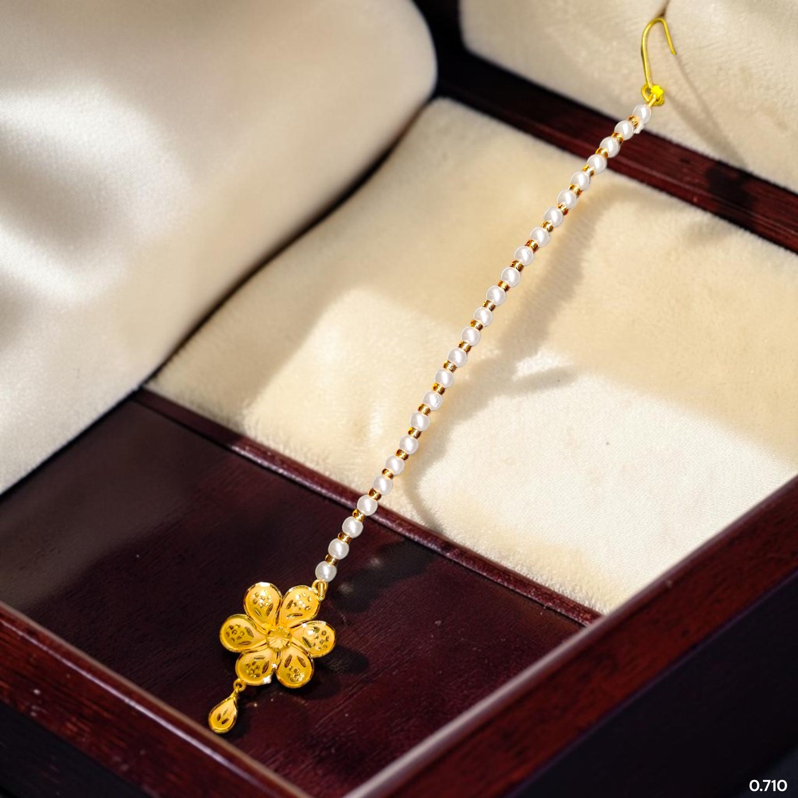 GOLD TICKLY- BIS CERTIFIED WGT: 0.710 GM APPROX HUID HALLMARK 916 22KT GOLD TICKLY (MANGTIKA) 1 PIECE FOR MARRIAGE.