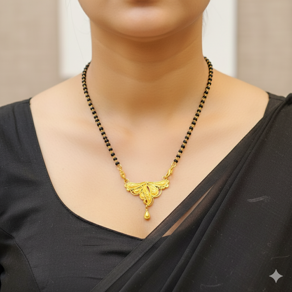 (GPM) TRJ WGT: 1.310 GM APPROX 22KT HUID HALLMARK GOLD PENDANT MANGALSUTRA 1 PIECE WITH TASSEL.