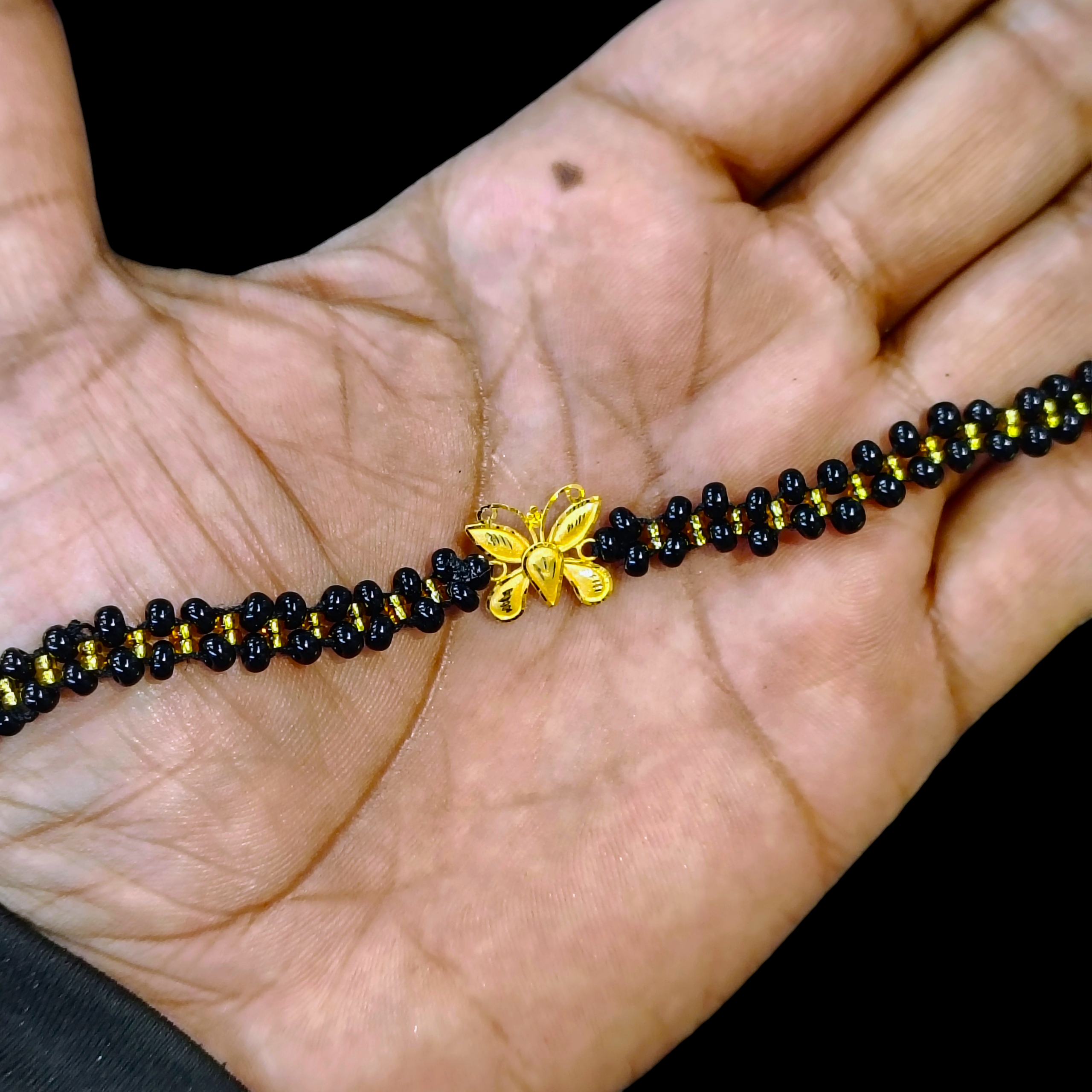 GOLD WRISTLET- BIS CERTIFIED HUID HALLMARK 916 22KT GOLD MANGALSUTRA WRISTLET BUTTERFLY DESIGN 7 INCH (WGT: 0.390-0.420 GM APPROX) WITH MANGALSUTRA CHAIN FOR WOMEN.