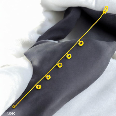 GOLD WRISTLET- BIS CERTIFIED HUID HALLMARK 375 9KT GOLD WRISTLET APPROX WGT: 1.060 FOR WOMEN.