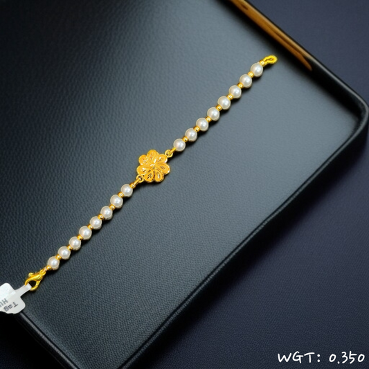 RAJLAXMI WGT: 0.350 GM APPROX HUID HALLMARK 916 22KT GOLD WRISTLET WITH PEARL CHAIN FOR BABY.