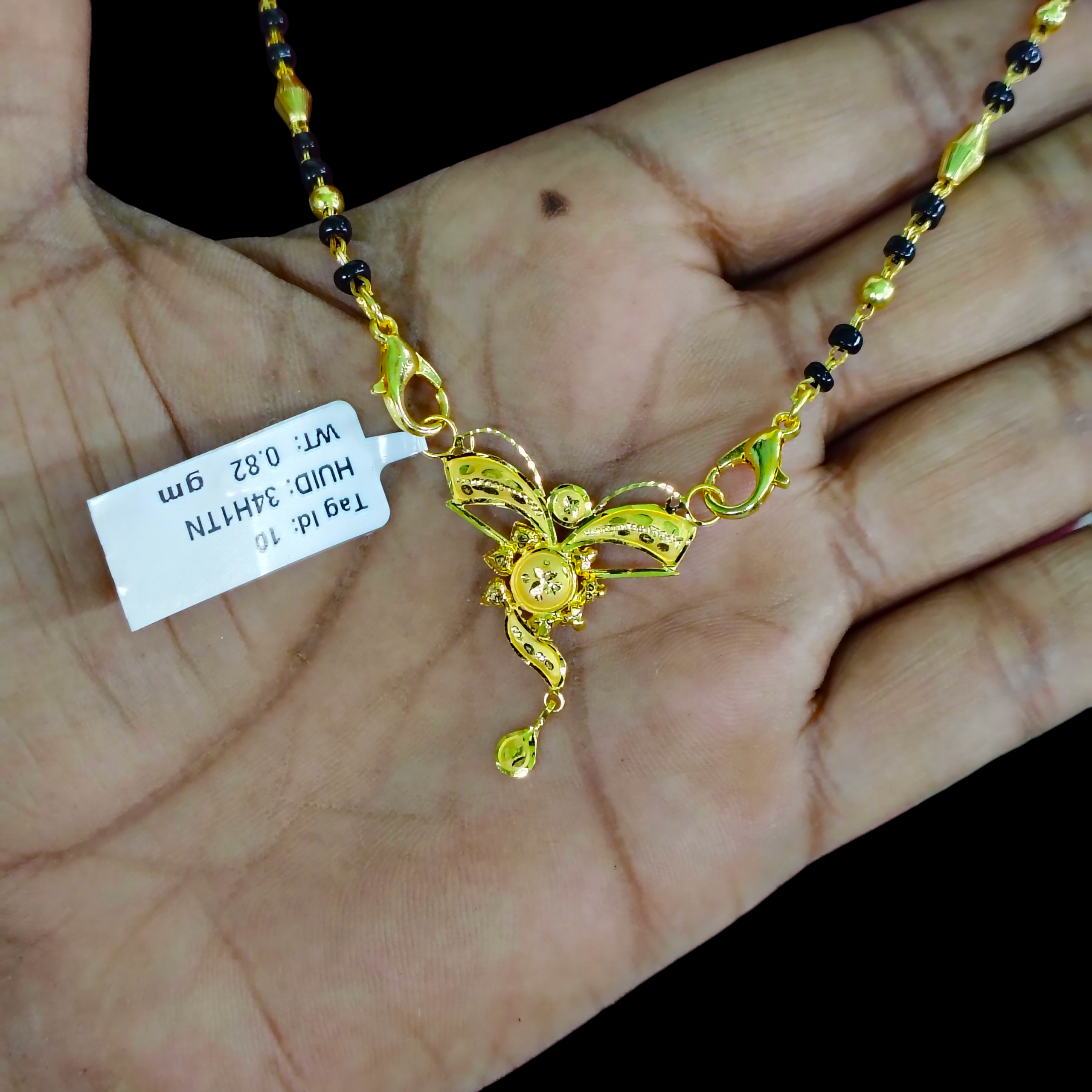 GOLD PENDANT- WGT: 0.820 GM APPROX 22KT HUID HALLMARK GOLD PENDANT MANGALSUTRA 1 PIECE WITH TASSEL.