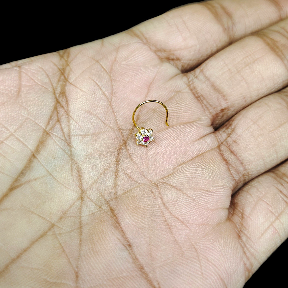 GOLD NOSEPIN- (WGT: 0.230 GM APPROX) BIS CERTIFIED HUID HALLMARK 375 9KT GOLD NOSEPIN 1 PIECE FOR WOMEN (FOR REGULAR USE). SOLD ON MRP.