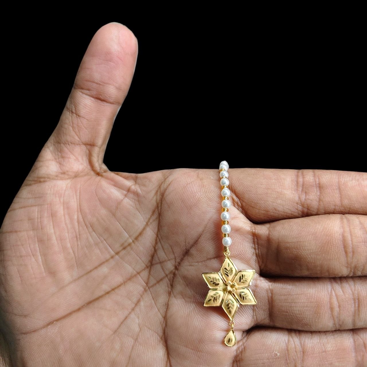GOLD TICKLY- BIS CERTIFIED WGT: 0.690 GM APPROX HUID HALLMARK 916 22KT GOLD TICKLY (MANGTIKA) 1 PIECE FOR MARRIAGE.