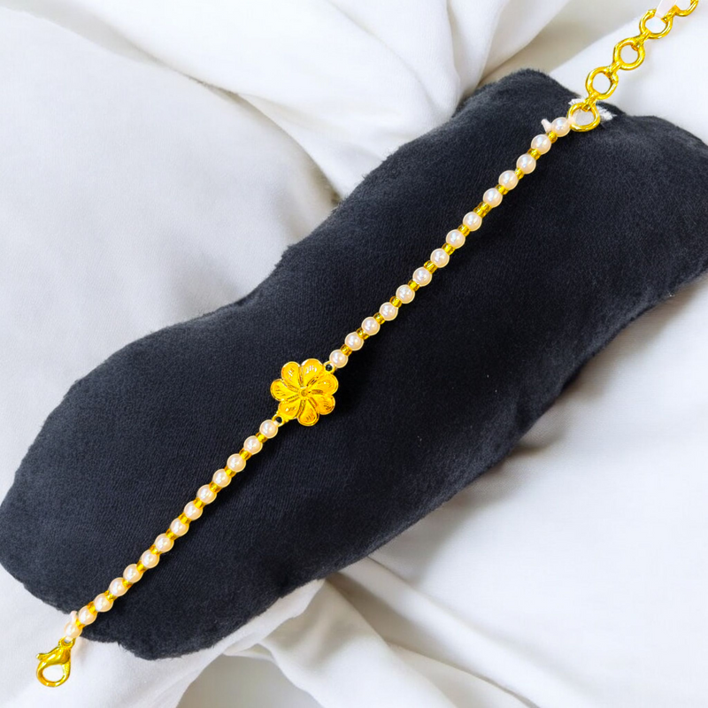 GOLD WRISTLET- BIS CERTIFIED HUID HALLMARK 916 22KT GOLD MOTI WRISTLET (WGT: 0.340-0.380 GM APPROX) WITH PEARL CHAIN FOR WOMEN.