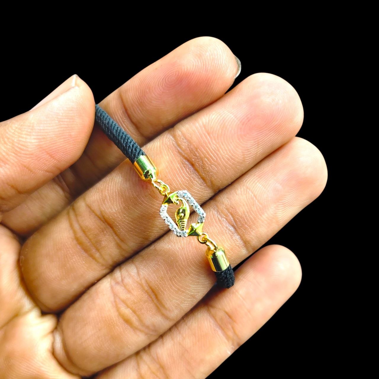 RAKHI- (WGT: 0.310 GM APPROX) BIS CERTIFIED HUID HALLMARK 375 9KT GOLD RAKHI FOR YOUR BELOVED BROTHER (ADJUSTABLE SIZE).