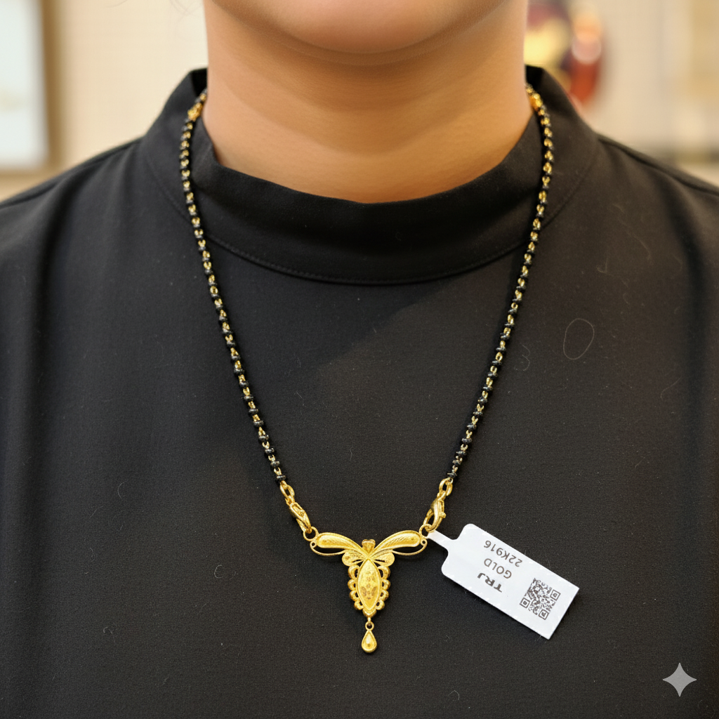 (GPM) TRJ WGT: 0.910 GM APPROX 22KT HUID HALLMARK GOLD PENDANT MANGALSUTRA 1 PIECE WITH TASSEL.