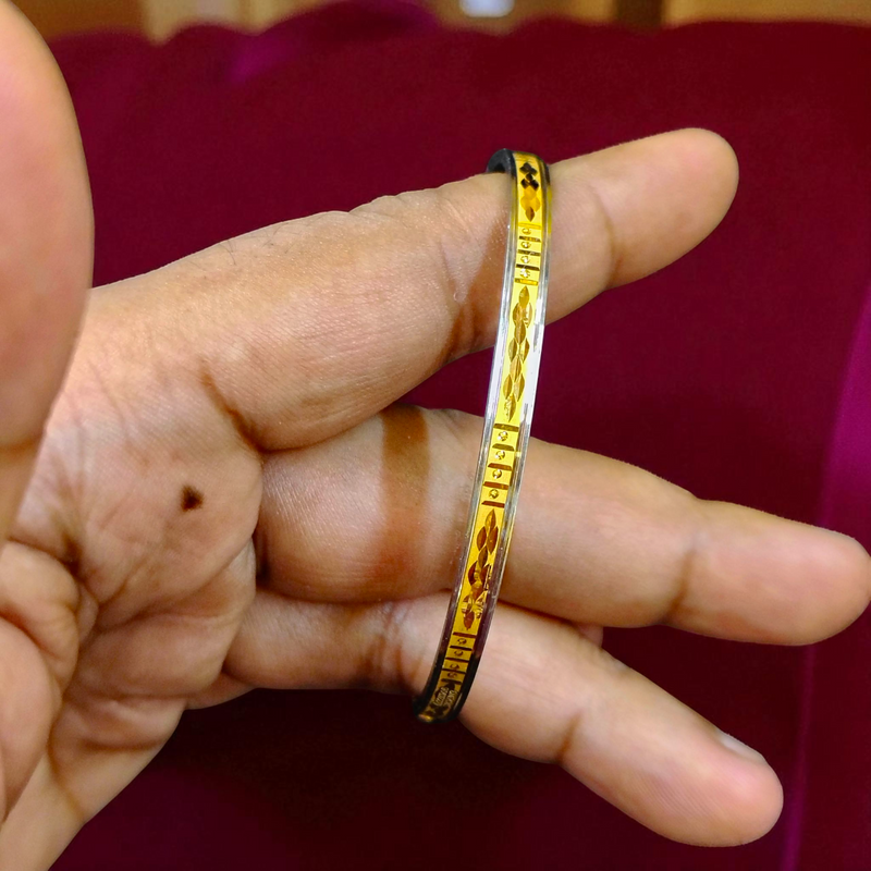 TRJ (SIZE: 27) WGT: 0.860 GM APPROX 22KT HUID HALLMARK GOLD NOA BANGLES (LAZER CHILA) 1 PIECE.