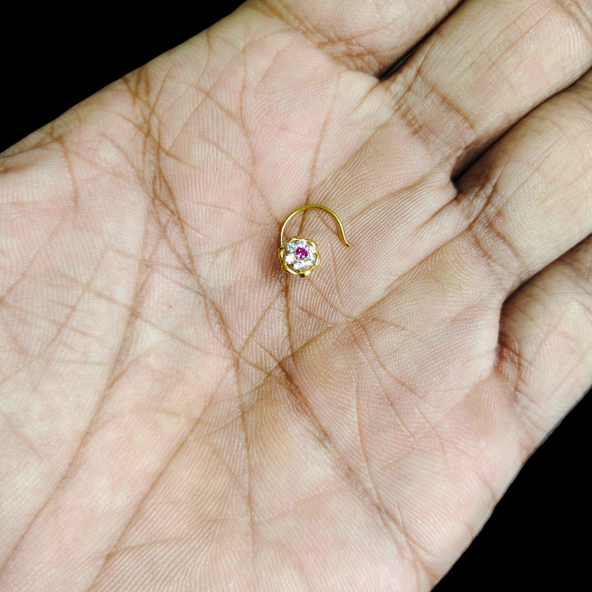 GOLD NOSEPIN- (WGT: 0.230 GM APPROX) BIS CERTIFIED HUID HALLMARK 375 9KT GOLD NOSEPIN 1 PIECE FOR WOMEN (FOR REGULAR USE). SOLD ON MRP.