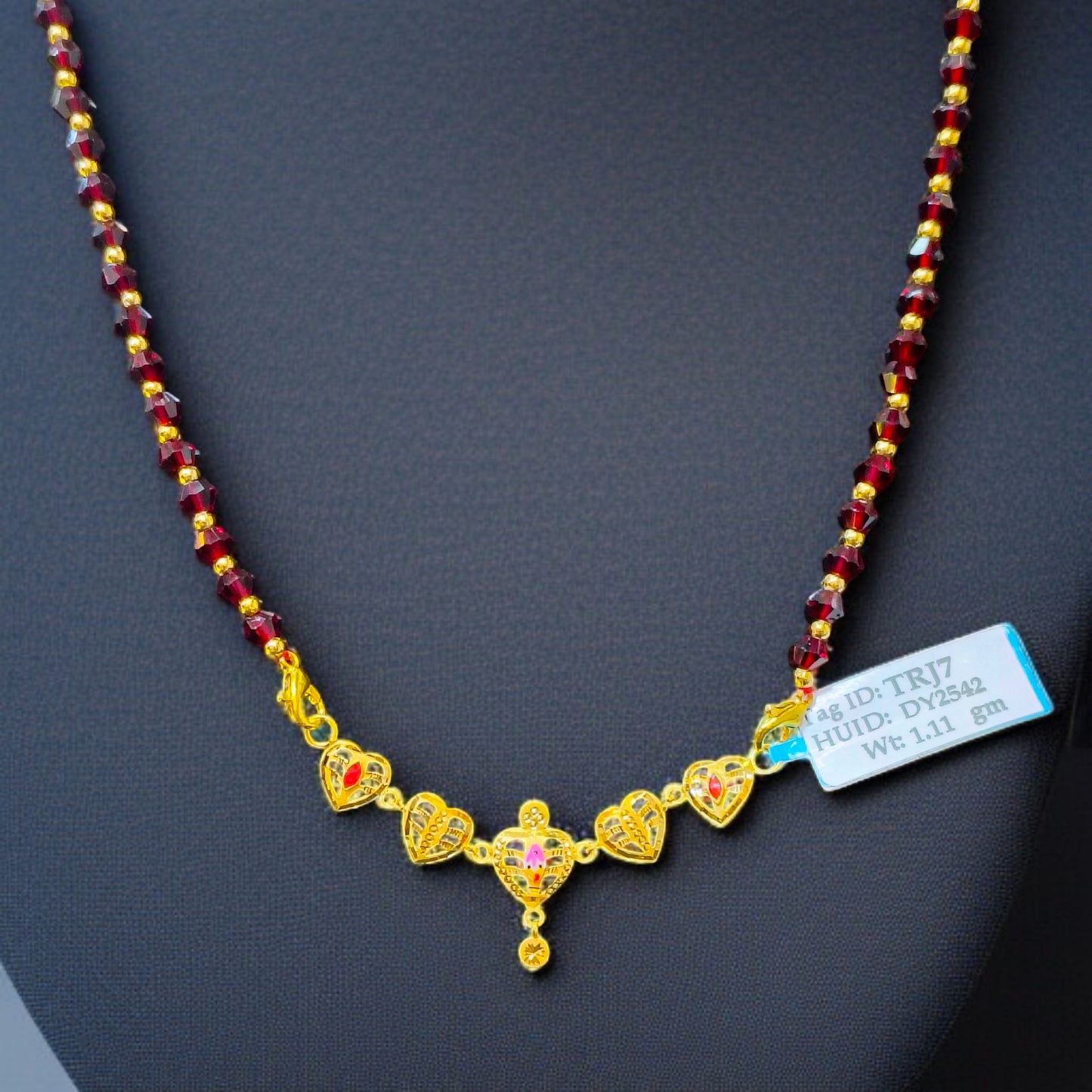 (GPM) TRJ WGT: 1.110 GM APPROX 22KT HUID HALLMARK GOLD PENDANT 1 PIECE WITH ADJUSTABLE TASSEL.