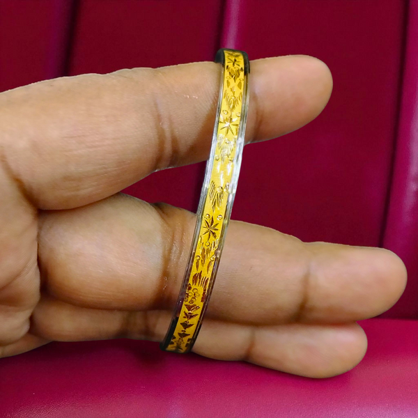 TRJ (SIZE: 25) WGT: 1.170 GM APPROX 22KT HUID HALLMARK GOLD NOA BANGLES (LAZER CHILA) 1 PIECE.
