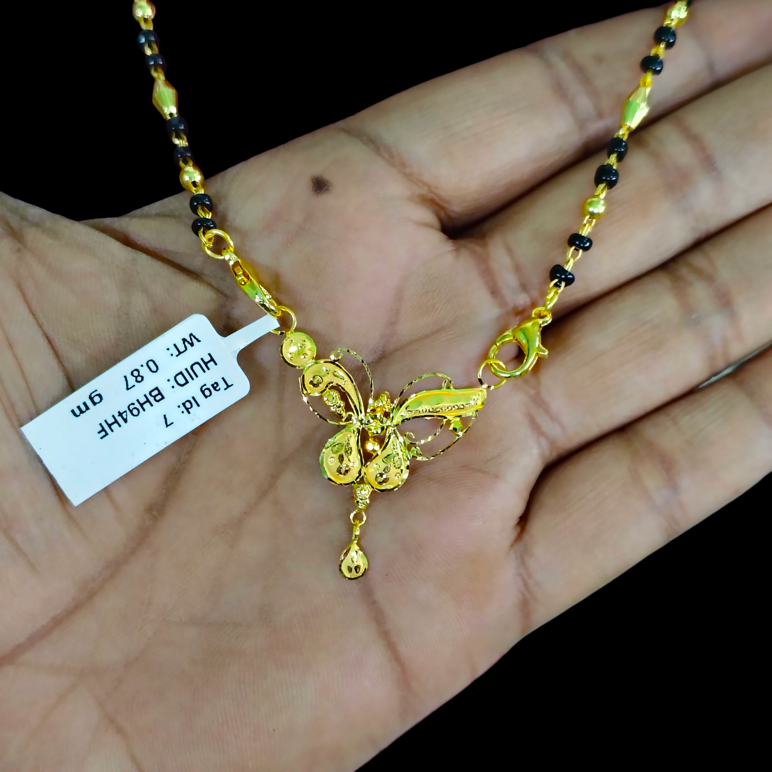 GOLD PENDANT- WGT: 0.870 GM APPROX 22KT HUID HALLMARK GOLD PENDANT MANGALSUTRA 1 PIECE WITH TASSEL.
