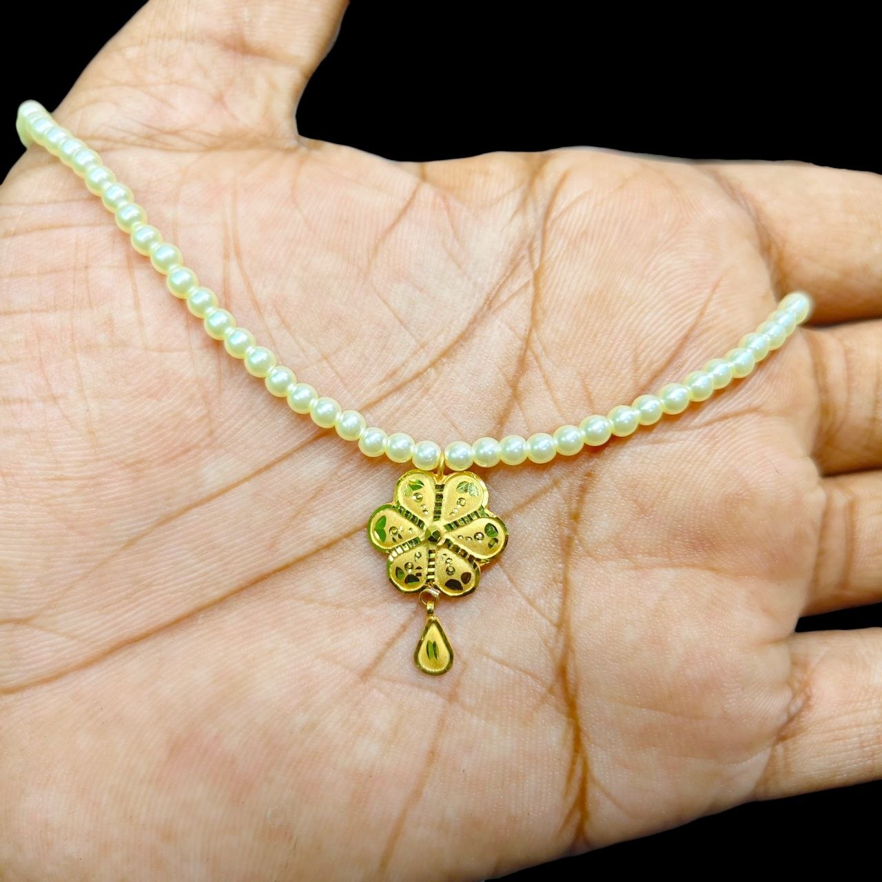 GOLD LOCKET- (WGT: 0.460 GM APPROX) BIS CERTIFIED HUID HALLMARK 9KT GOLD LOCKET 1 PIECE FOR WOMEN (WITH MOTI CHAIN).
