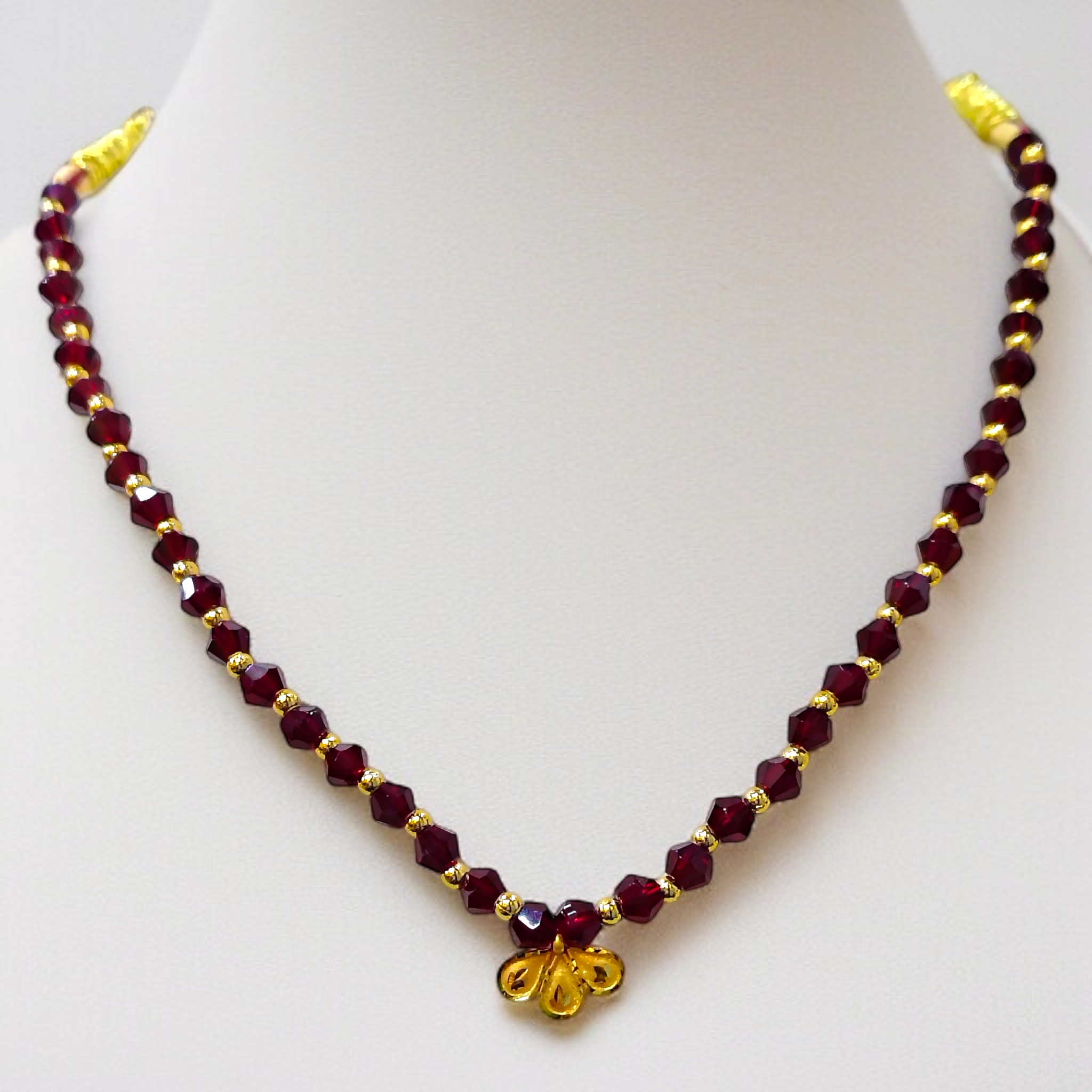 (GML) TRJ WGT: 0.120 GM APPROX KDM GOLD DROPS DESIGN LOCKET 1 PIECE WITH MAROON CRYSTAL ADJUSTABLE TASSEL FOR GIFT PURPOSE (50 TONCH).