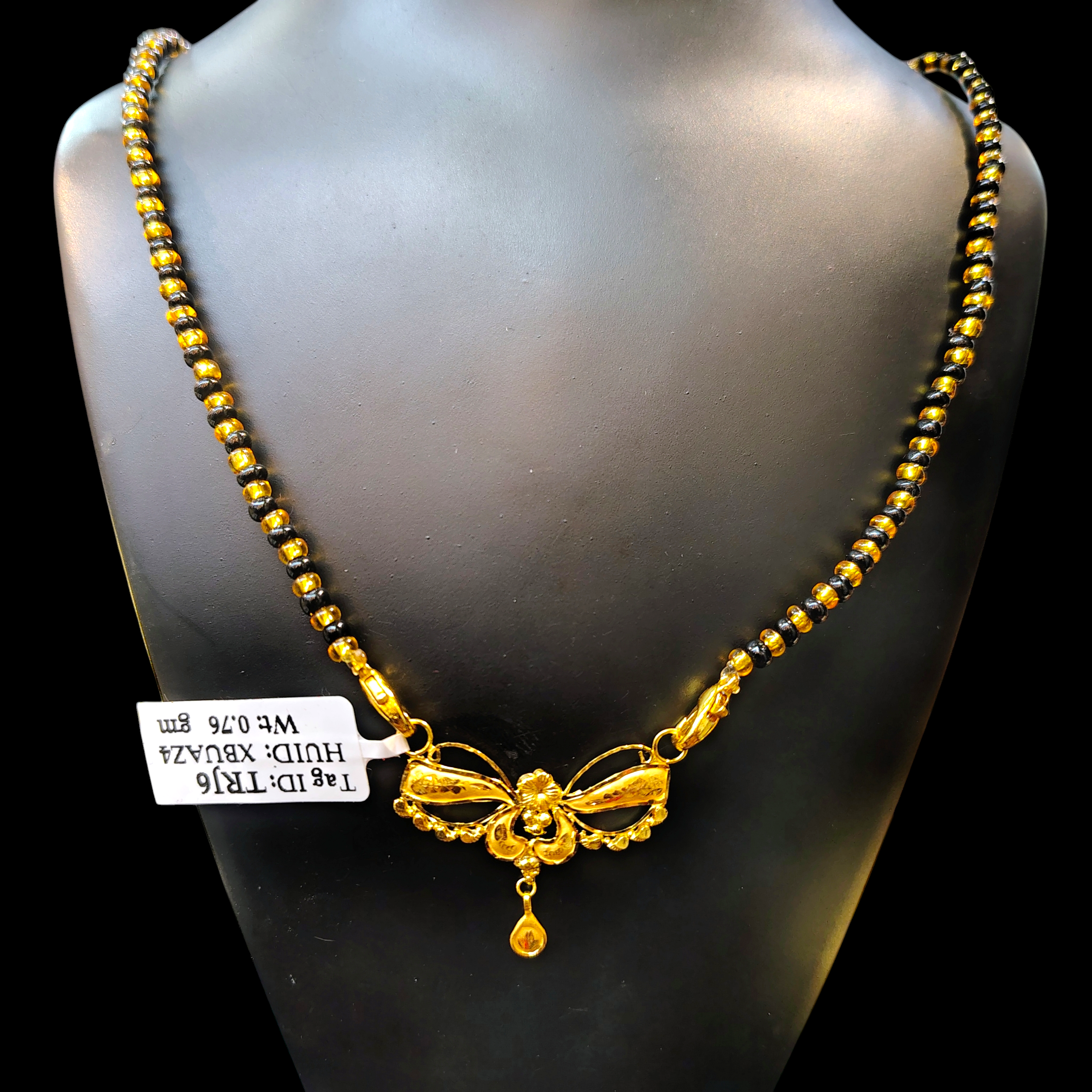 GOLD PENDANT- WGT: 0.760 GM APPROX 22KT HUID HALLMARK GOLD PENDANT MANGALSUTRA 1 PIECE WITH TASSEL.