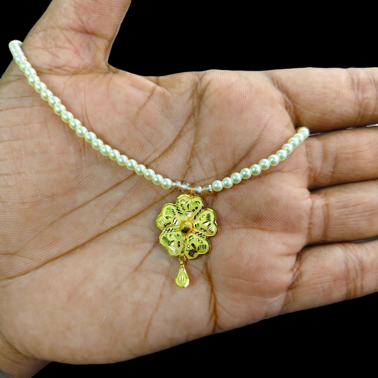 GOLD LOCKET- (WGT: 0.710 GM APPROX) BIS CERTIFIED HUID HALLMARK 9KT GOLD LOCKET 1 PIECE FOR WOMEN (WITH MOTI CHAIN).