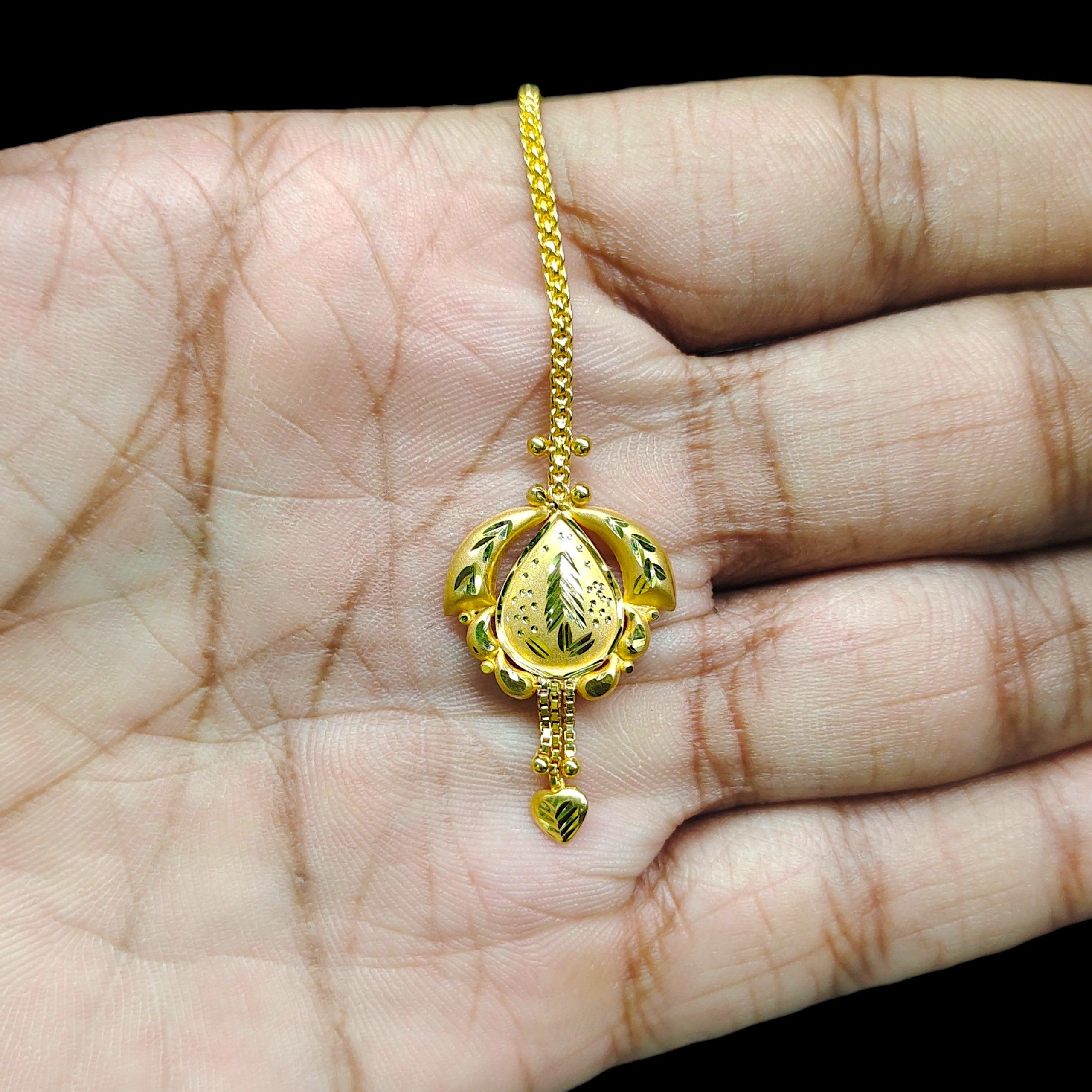 GOLD TICKLY- (WGT: 1.750 GM APPROX) CERTIFIED BIS HUID HALLMARK 375 9KT GOLD TICKLY (MANGTIKA) 1 PIECE FOR MARRIAGE.