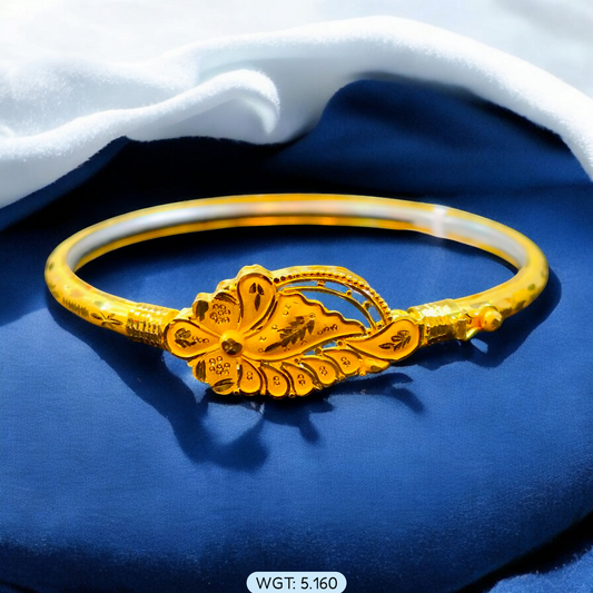 TRJ (SIZE: 24) WGT: 5.160 GM APPROX 22KT HUID HALLMARK GOLD HALF COVERING NOA BANGLES 1 PIECE.
