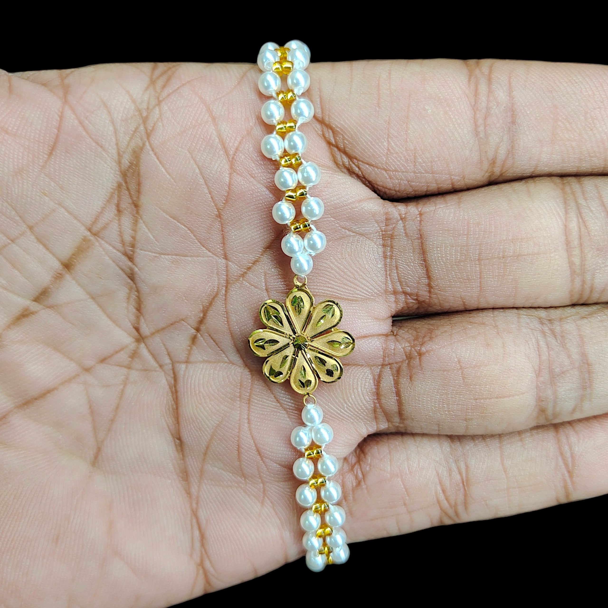 GOLD WRISTLET- (WGT: 0.420 GM APPROX) BIS CERTIFIED HUID HALLMARK 375 9KT GOLD WRISTLET (BRACELET) WITH MOTI CHAIN FOR WOMEN (ADJUSTABLE SIZE).