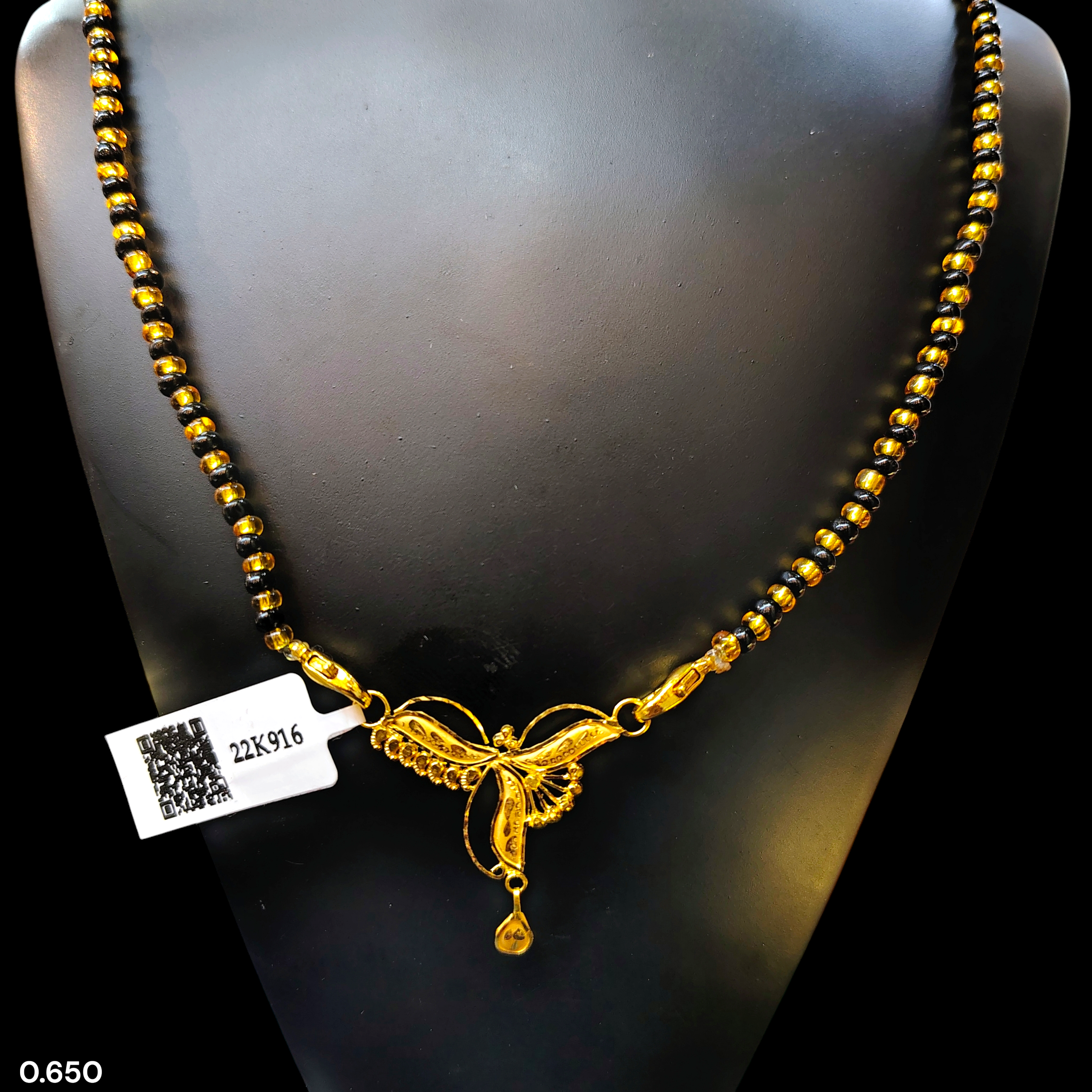 GOLD PENDANT- WGT: 0.650 GM APPROX 22KT HUID HALLMARK GOLD PENDANT MANGALSUTRA 1 PIECE WITH TASSEL.