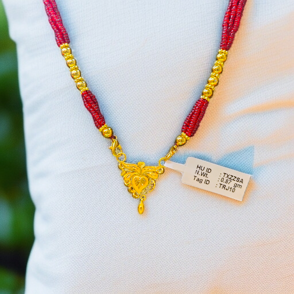 TRJ WGT: 0.870 GM APPROX 22KT HUID HALLMARK GOLD PENDANT MANGALSUTRA 1 PIECE WITH TASSEL.