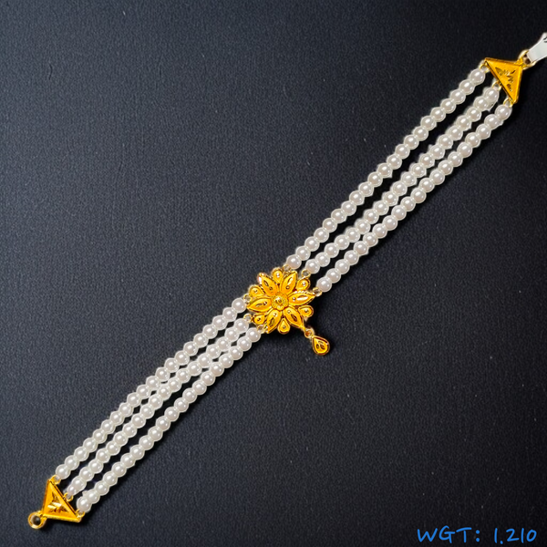 (GCN) TRJ WGT: 1.210 GM APPROX 22KT HALLMARK HUID GOLD MOTI CHOKER 1 PIECE WITH ADJUSTABLE TASSEL.