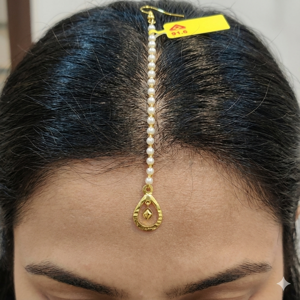 GOLD TICKLY- TRJ WGT: 0.320 GM APPROX 18KT HUID HALLMARK GOLD MOTI TICKLY (MANGTIKA) 1 PIECE FOR MARRIAGE.