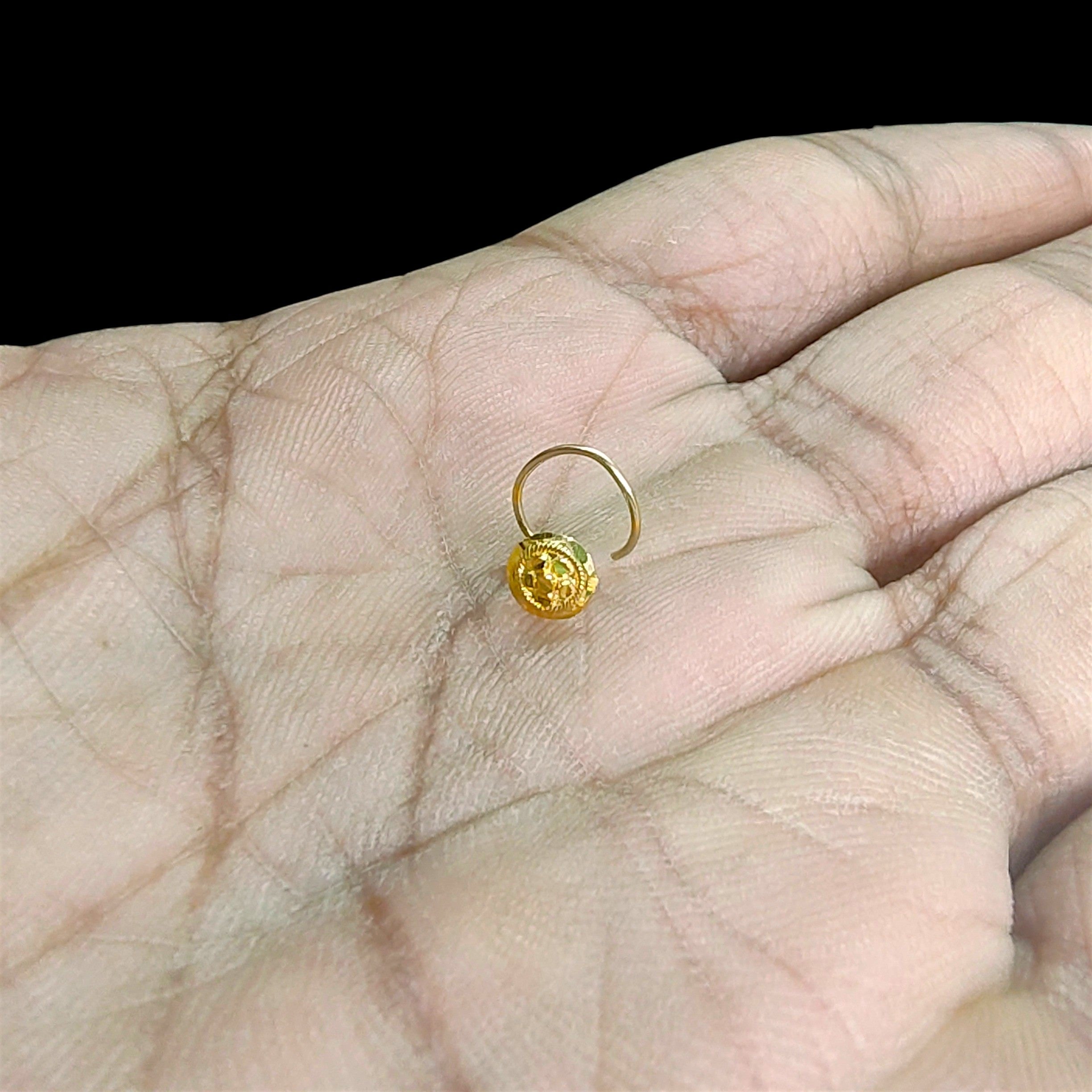GOLD NOSEPIN- BIS CERTIFIED HUID HALLMARK 375 9KT GOLD NOSEPIN 1 PIECE FOR WOMEN (FOR REGULAR USE). SOLD ON MRP.