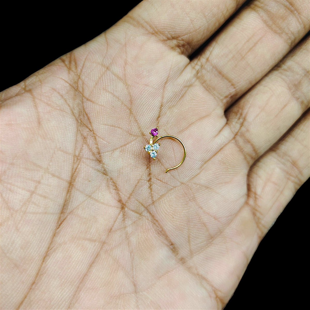 GOLD NOSEPIN- (WGT: 0.230 GM APPROX) BIS CERTIFIED HUID HALLMARK 375 9KT GOLD NOSEPIN 1 PIECE FOR WOMEN (FOR REGULAR USE). SOLD ON MRP.