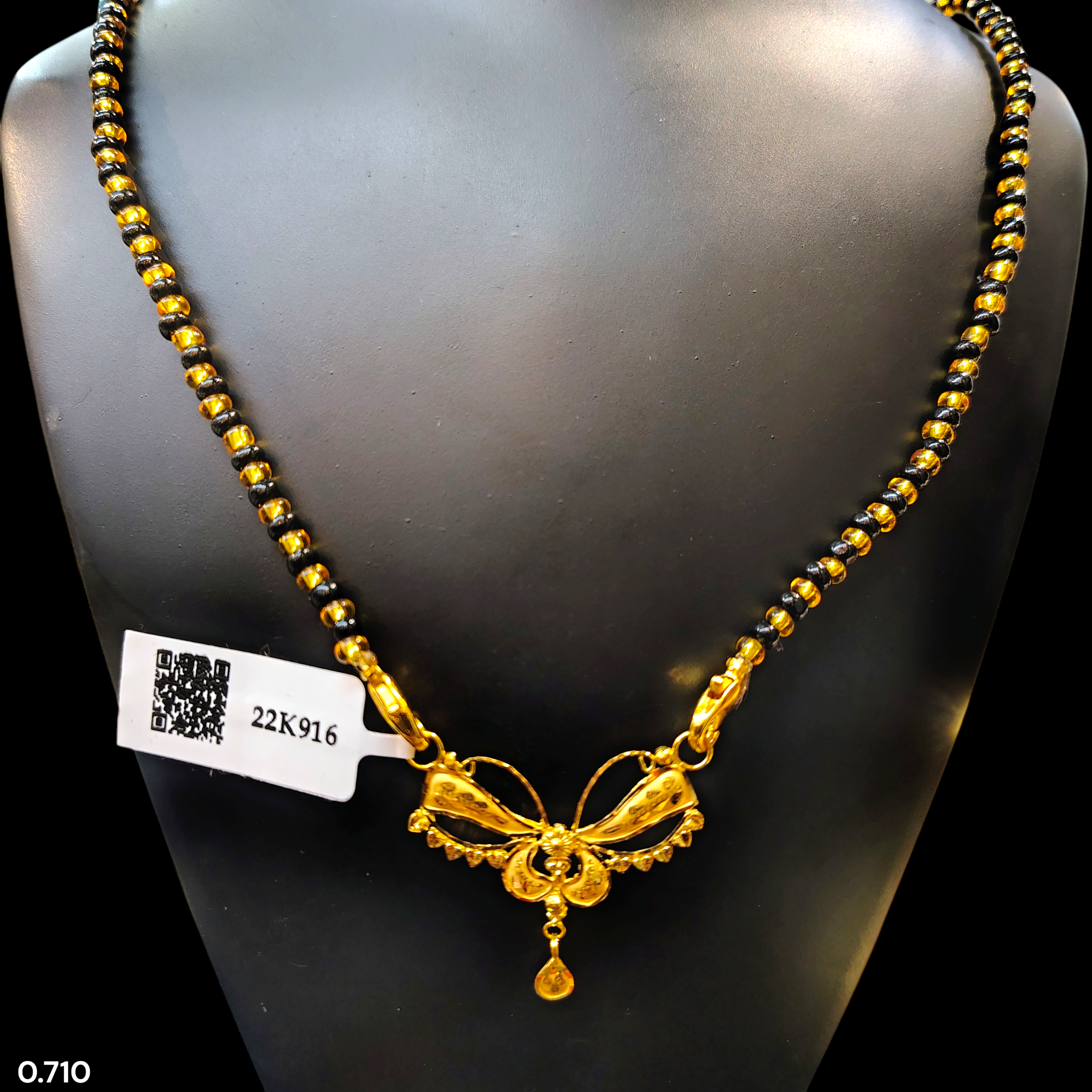 GOLD PENDANT- WGT: 0.710 GM APPROX 22KT HUID HALLMARK GOLD PENDANT MANGALSUTRA 1 PIECE WITH TASSEL.