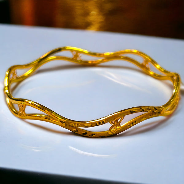 TRJ MTO (CAW) DUPLEX TRIBAL DESIGN HALLMARK 22KT GOLD COVER BANGLE 1 PIECE APPROX WGT: 2.200 GM FOR WOMEN - (BILL MANDATORY -EXCHANGE FOR LIFETIME IN STORE ONLY).