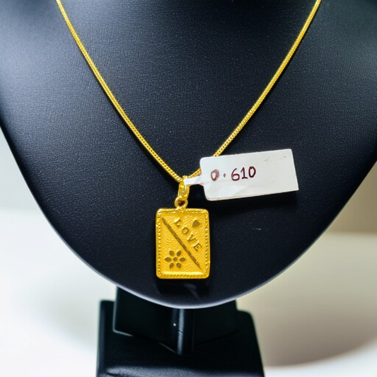 TRJ WGT: 0.610 GM APPROX KDM GOLD LOCKET 1 PIECE (50 TONCH) WITH ADJUSTABLE TASSEL.