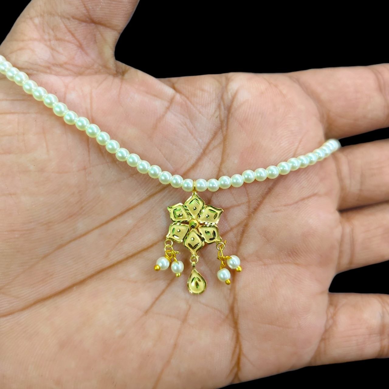 GOLD LOCKET- (WGT: 0.510 GM APPROX) BIS CERTIFIED HUID HALLMARK 9KT GOLD LOCKET 1 PIECE FOR WOMEN (WITH MOTI CHAIN).