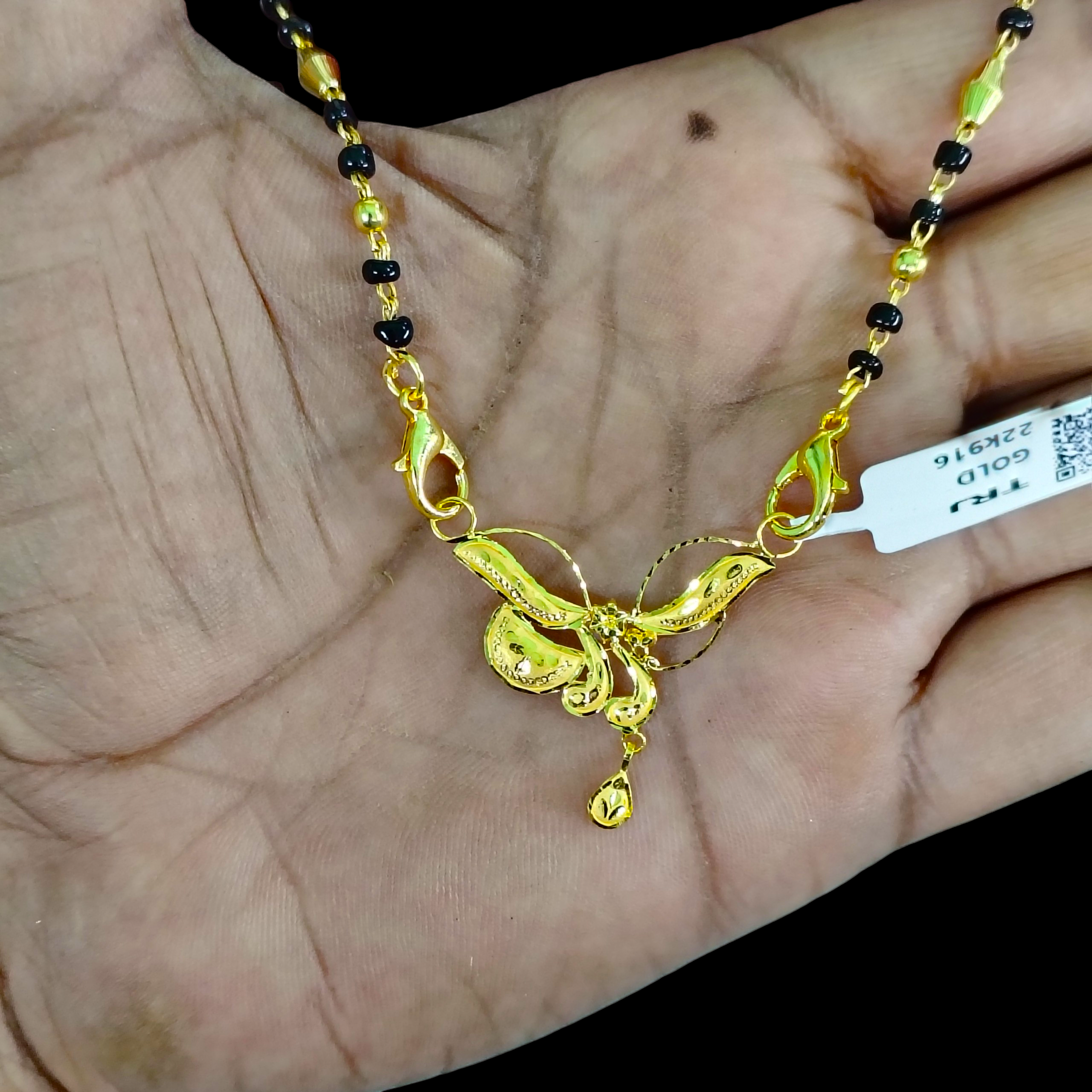 GOLD PENDANT- WGT: 0.680 GM APPROX 22KT HUID HALLMARK GOLD PENDANT MANGALSUTRA 1 PIECE WITH TASSEL.