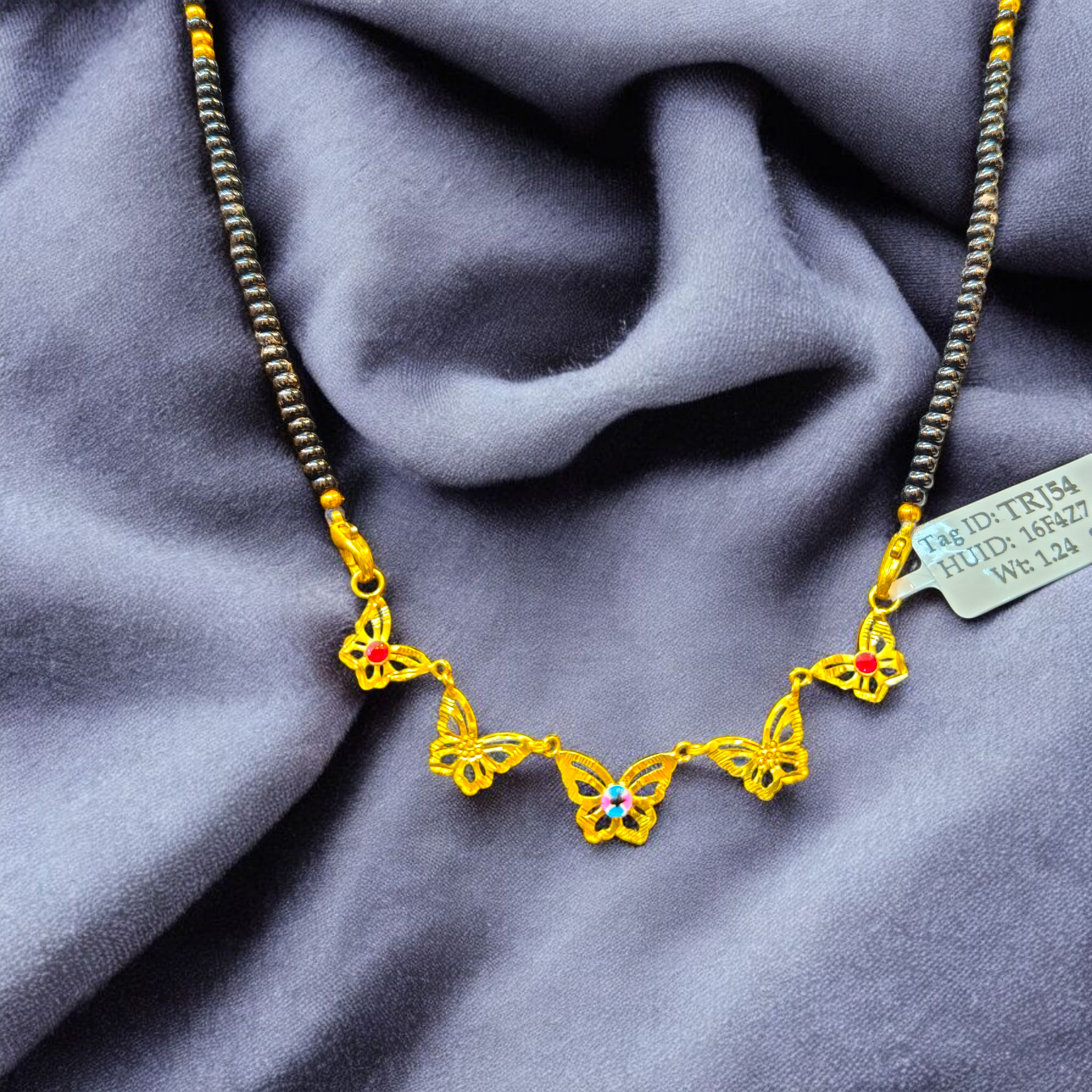 (GPM) TRJ WGT: 1.240 GM APPROX 22KT HUID HALLMARK GOLD PENDANT 1 PIECE WITH ADJUSTABLE TASSEL.