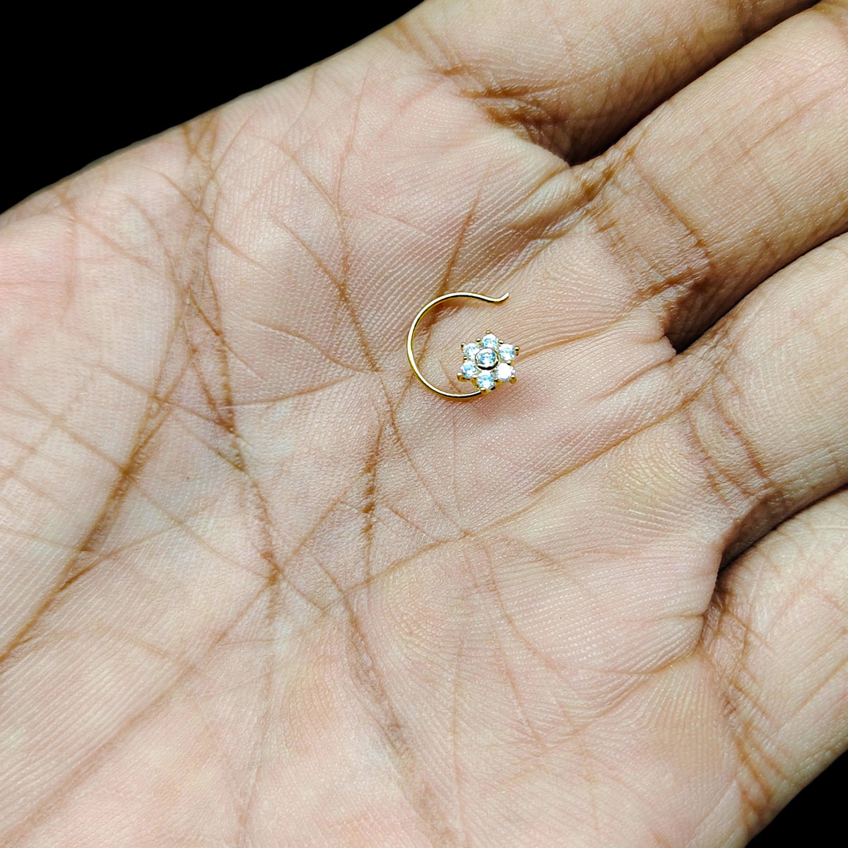 GOLD NOSEPIN- (WGT: 0.230 GM APPROX) BIS CERTIFIED HUID HALLMARK 375 9KT GOLD NOSEPIN 1 PIECE FOR WOMEN (FOR REGULAR USE). SOLD ON MRP.