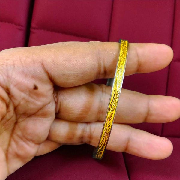 TRJ (SIZE: 27) WGT: 0.880 GM APPROX 22KT HUID HALLMARK GOLD NOA BANGLES (LAZER CHILA) 1 PIECE.