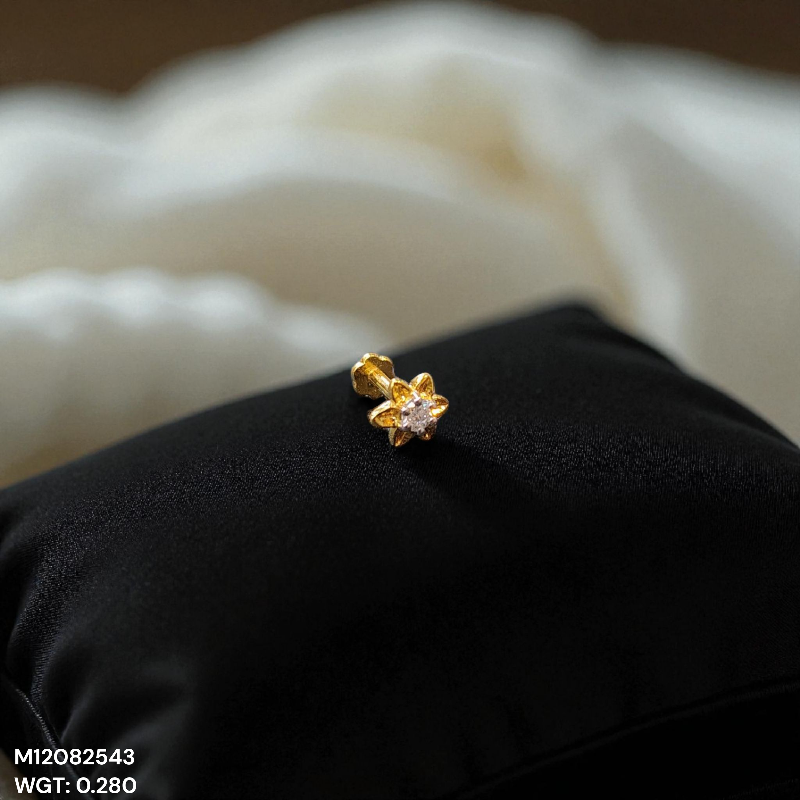 (GNP) RAJLAXMI DIAMOND JEWELLERY - WGT: 0.280 GM - NATURAL DIAMOND (0.04 CENT) HUID HALLMARK 18KT DIAMOND NOSEPIN FOR WOMEN WITH CERTIFICATE OF AUTHENTICITY BY IGJI (DESIGN NO: M12082543).