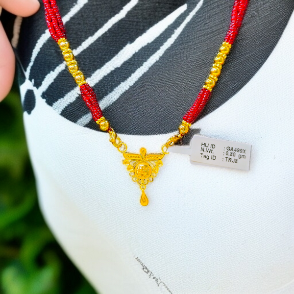 TRJ WGT: 0.800 GM APPROX 22KT HUID HALLMARK GOLD PENDANT MANGALSUTRA 1 PIECE WITH TASSEL.