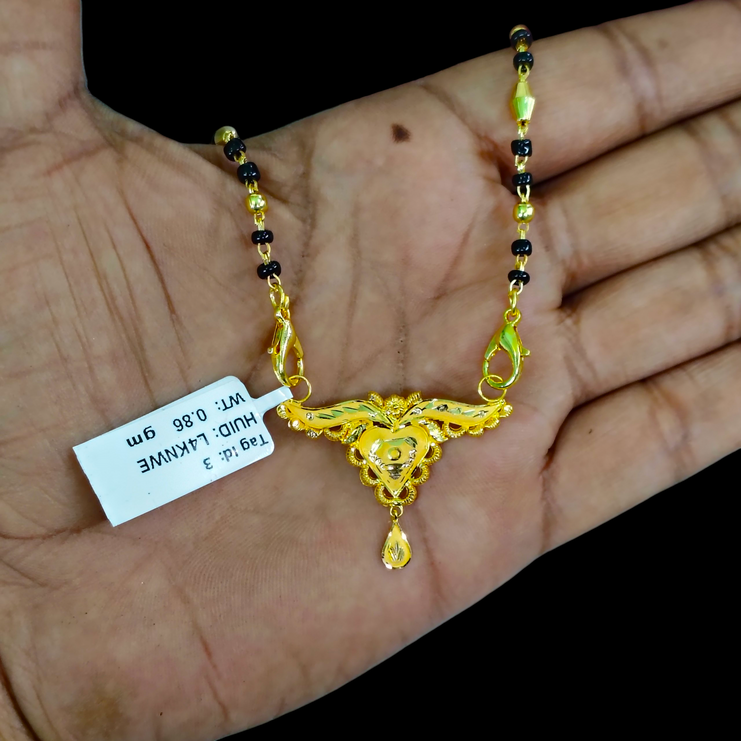 GOLD PENDANT- WGT: 0.860 GM APPROX 22KT HUID HALLMARK GOLD PENDANT MANGALSUTRA 1 PIECE WITH TASSEL.