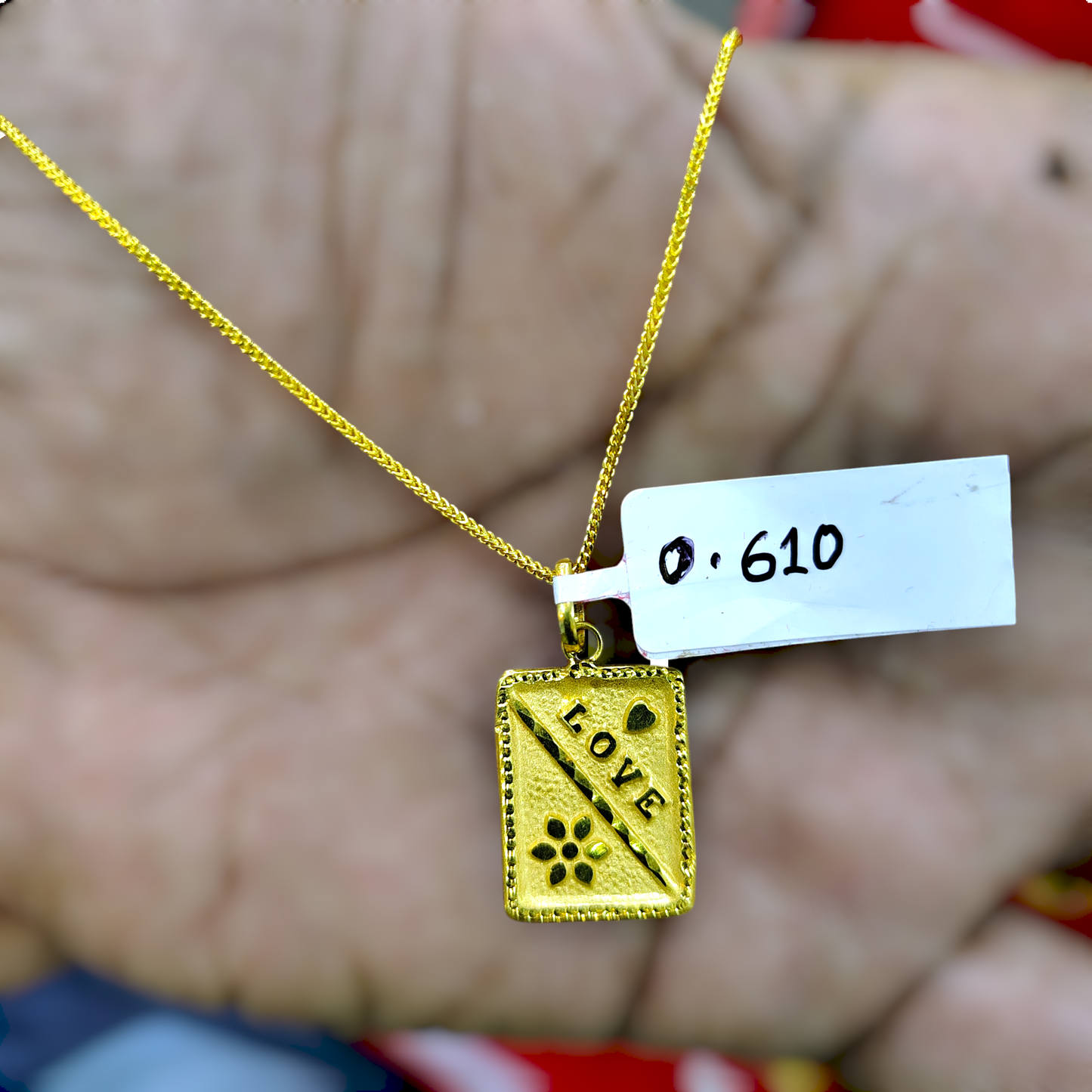 TRJ WGT: 0.610 GM APPROX KDM GOLD LOCKET 1 PIECE (50 TONCH) WITH ADJUSTABLE TASSEL.