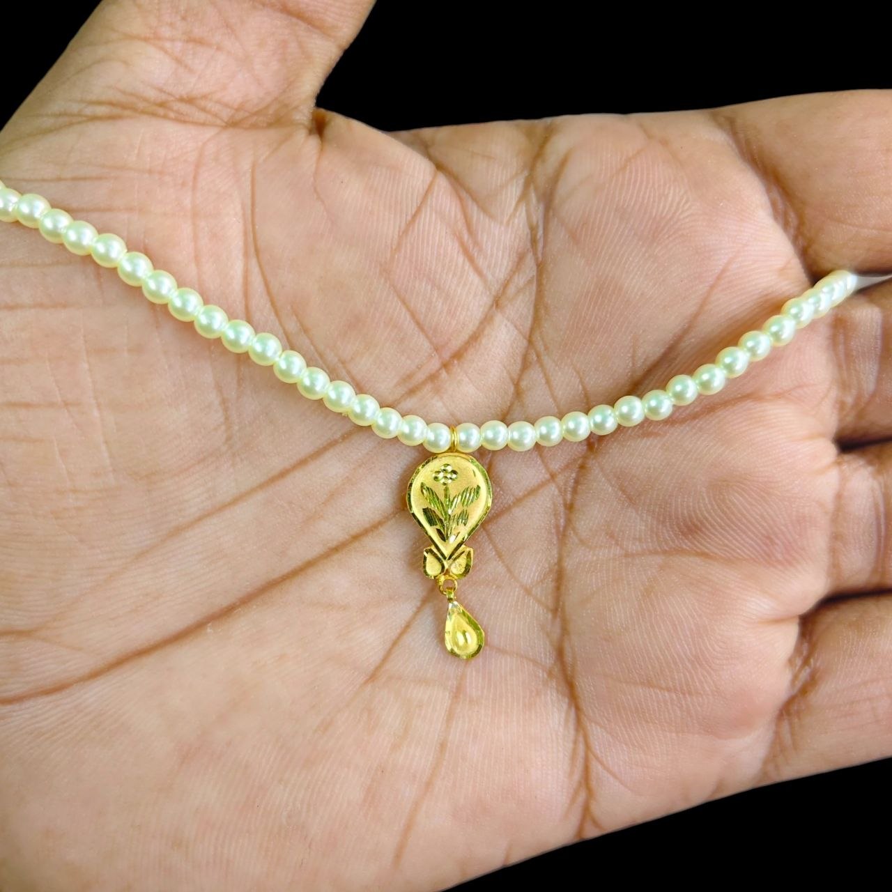 GOLD LOCKET- (WGT: 0.290 GM APPROX) BIS CERTIFIED HUID HALLMARK 9KT GOLD LOCKET 1 PIECE FOR WOMEN (WITH MOTI CHAIN).