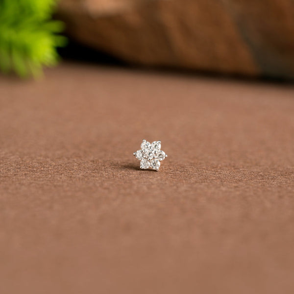 NOSEPIN- RAJLAXMI DIAMOND JEWELLERY - WGT: 0.205 GM - NATURAL DIAMOND (0.05 CENT) HUID HALLMARK 18KT DIAMOND NOSEPIN FOR WOMEN WITH CERTIFICATE OF AUTHENTICITY BY IGJI (DESIGN NO: M12082567).