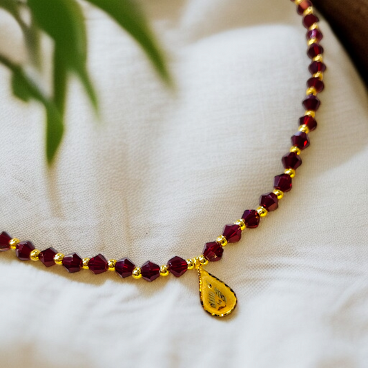 TRJ WGT: 0.140 GM APPROX KDM GOLD DROP DESIGN LOCKET 1 PIECE WITH MAROON CRYSTAL ADJUSTABLE TASSEL FOR GIFT PURPOSE (50 TONCH).