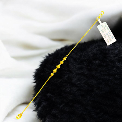 GOLD WRISTLET- BIS CERTIFIED HUID HALLMARK 375 9KT GOLD WRISTLET APPROX WGT: 1.240 FOR WOMEN.