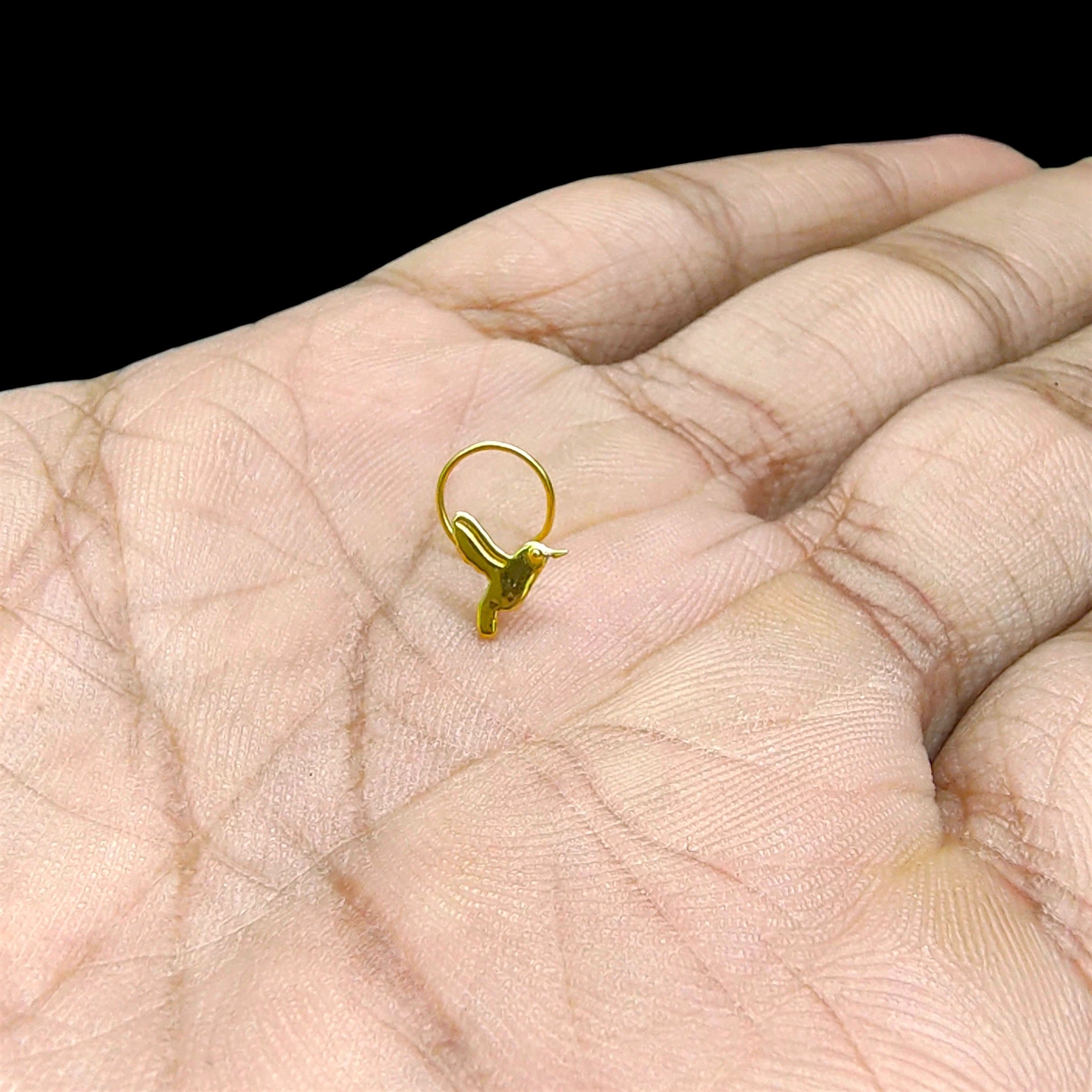 GOLD NOSEPIN- BIS CERTIFIED HUID HALLMARK 375 9KT GOLD NOSEPIN 1 PIECE FOR WOMEN (FOR REGULAR USE). SOLD ON MRP.