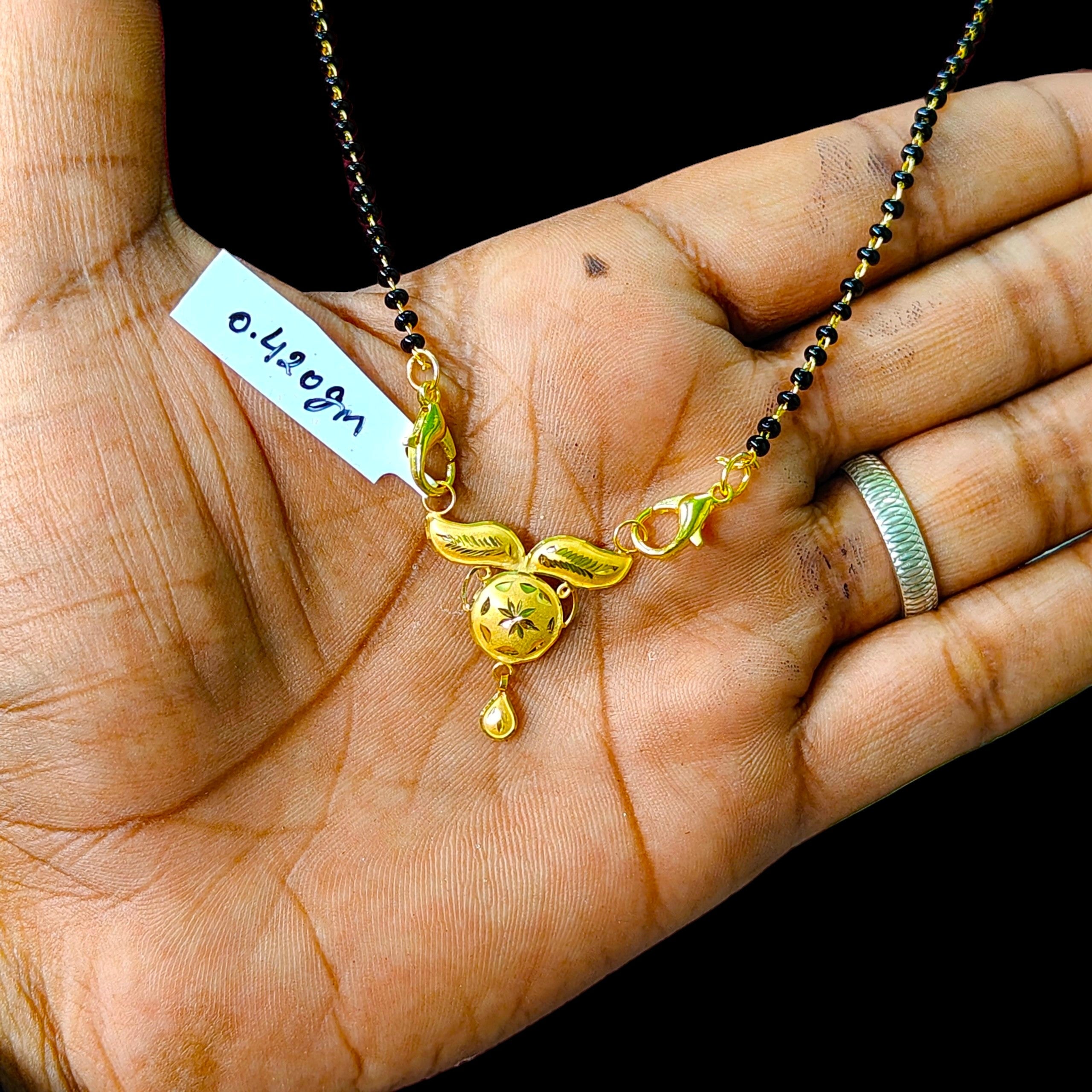 GOLD PENDANT- (WGT: 0.420 GM APPROX) BIS CERTIFIED HUID HALLMARK 375 9KT GOLD PENDANT FOR WOMEN 1 PIECE WITH FREE MANGALSUTRA & TASSEL.