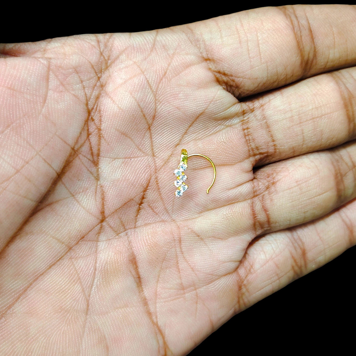 GOLD NOSEPIN- (WGT: 0.250 GM APPROX) BIS CERTIFIED HUID HALLMARK 375 9KT GOLD NOSEPIN 1 PIECE FOR WOMEN (FOR REGULAR USE). SOLD ON MRP.